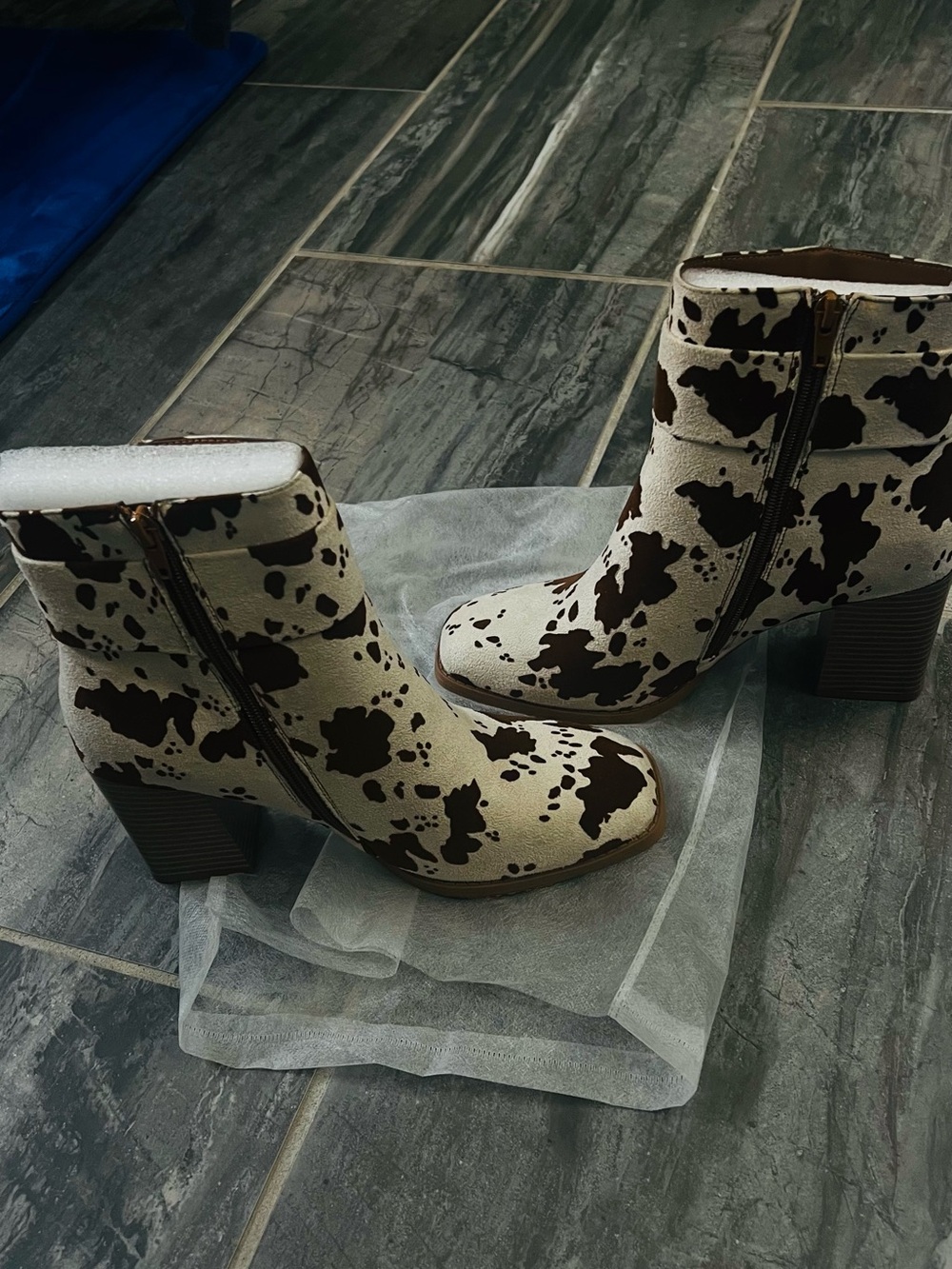 Pierre Dumas Cow-Print Ankle Booties in Cream and Brown